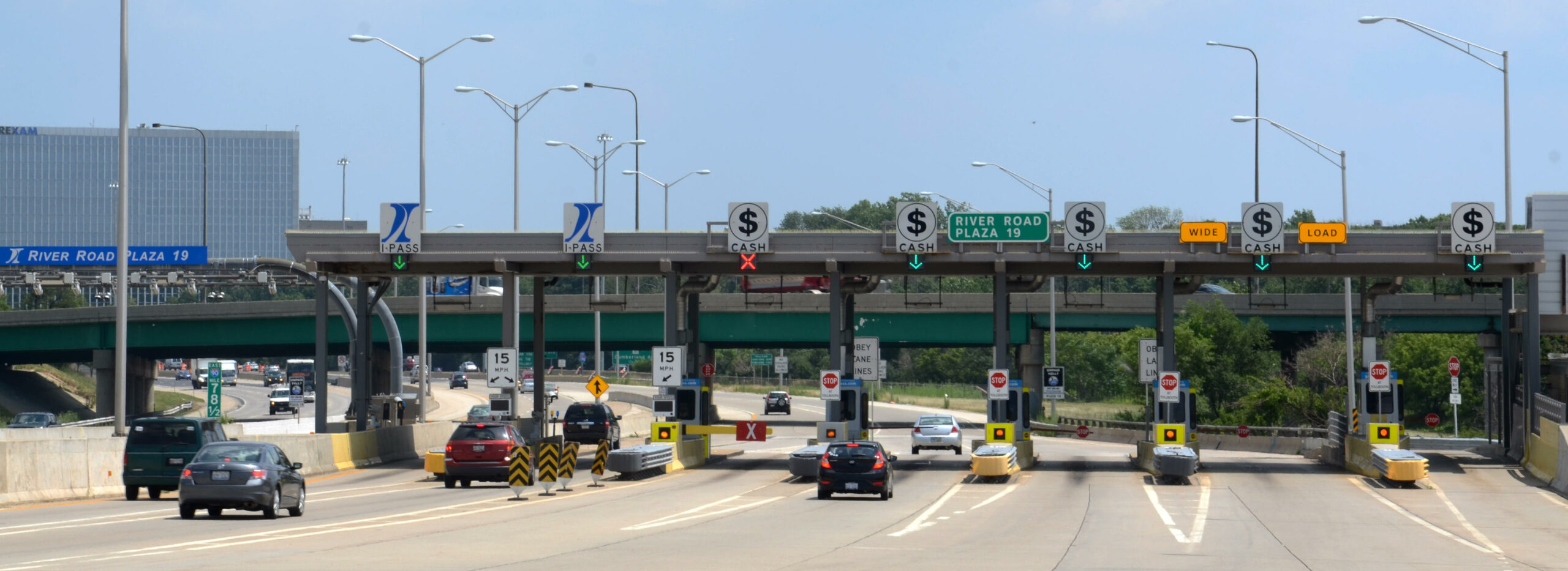 CHICAGO – JULY 18: Toll plaza near Chicago, on July 18, 2013. Eighty six percent of Illinois Tollway drivers use I-PASS transponders, which allow them to drive through open road tolling lanes.